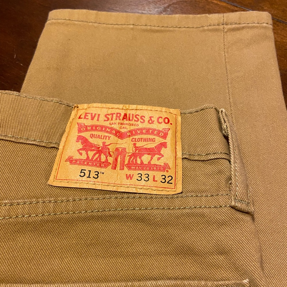 Tan Levi’s 513 jeans